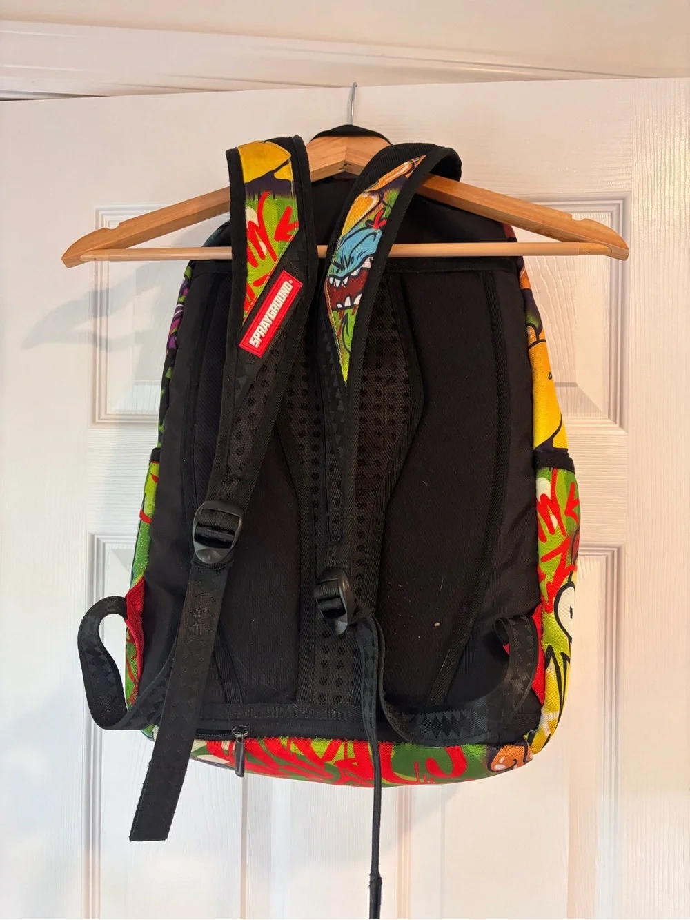 Sprayground Rick and Morty: Genius Backpack in green graffiti design